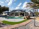 Backyard featuring a pool, patio area, and well-maintained landscaping at 1251 Cavalry St, Pahrump, NV 89048