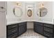 Elegant bathroom with dual vanities, stylish mirrors, and designer touches at 1251 Cavalry St, Pahrump, NV 89048