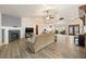 Expansive living room featuring vaulted ceilings, fireplace, and an open concept layout at 1251 Cavalry St, Pahrump, NV 89048