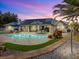Stunning backyard pool with ample space for entertaining and relaxing with desert landscaping at 1251 Cavalry St, Pahrump, NV 89048