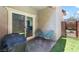 Charming patio area with pavers, artificial grass, and outdoor seating at 1323 Cerulean Ave, Henderson, NV 89002