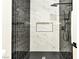 Stylish shower with patterned tile and modern showerhead in the bathroom at 1724 Navajo Lake Way, Las Vegas, NV 89128