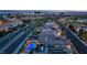 Aerial view of a neighborhood at sunset showcasing many homes at 1972 Alcova Ridge Dr, Las Vegas, NV 89135