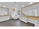 Bright bathroom with a soaking tub, dual sinks, and vanity with decorative pendant lighting at 1972 Alcova Ridge Dr, Las Vegas, NV 89135