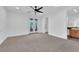 A bright and airy main bedroom boasts a private balcony access and an ensuite bathroom with modern finishes at 1972 Alcova Ridge Dr, Las Vegas, NV 89135
