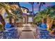 Inviting home entrance with a landscaped walkway and decorative planters at 1972 Alcova Ridge Dr, Las Vegas, NV 89135