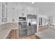 Modern kitchen showcases stainless steel appliances, custom cabinets, and sleek countertops at 1972 Alcova Ridge Dr, Las Vegas, NV 89135