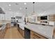 Bright kitchen with a center island, stainless steel appliances, and an open floor plan at 1972 Alcova Ridge Dr, Las Vegas, NV 89135