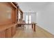 A light-filled office space with custom wood built-ins and hardwood flooring at 1972 Alcova Ridge Dr, Las Vegas, NV 89135