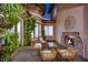 Cozy outdoor patio with fireplace and comfortable seating for relaxing evenings at 1972 Alcova Ridge Dr, Las Vegas, NV 89135