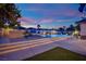 Inviting backyard pool and spa with a lounge area, perfect for relaxing evenings at 1972 Alcova Ridge Dr, Las Vegas, NV 89135