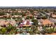Expansive aerial view of the neighborhood with numerous pools and lush landscaping at 2101 Diamond Bar Dr, Las Vegas, NV 89117