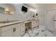 Elegant bathroom featuring double sink vanity, marble floors and granite countertop at 2101 Diamond Bar Dr, Las Vegas, NV 89117