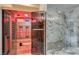 Luxurious bathroom with modern sauna and glass enclosed shower with marble tiling at 2101 Diamond Bar Dr, Las Vegas, NV 89117