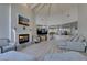 Open living area showcases a fireplace, modern TV, and stylish design flowing into the kitchen at 2101 Diamond Bar Dr, Las Vegas, NV 89117