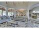 Spacious living room featuring vaulted ceilings, marble floors, and modern furnishings at 2101 Diamond Bar Dr, Las Vegas, NV 89117