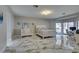 Spacious main bedroom with luxurious marble floors and a dedicated office area at 2101 Diamond Bar Dr, Las Vegas, NV 89117