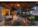 The well-lit outdoor seating area provides a cozy and inviting space for nighttime relaxation and entertainment at 2101 Diamond Bar Dr, Las Vegas, NV 89117
