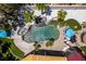 Overhead view of freeform pool, spa, and patio with shade structures and landscaping at 2101 Diamond Bar Dr, Las Vegas, NV 89117