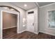 Charming hallway features hardwood floors, neutral paint, and modern doors and trim at 2158 High Mesa Dr, Henderson, NV 89012