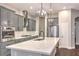 Kitchen view showing island with seating, ample counter space and stainless steel appliances at 2158 High Mesa Dr, Henderson, NV 89012