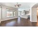Open-concept living room that opens up to the kitchen and the backyard pool at 2158 High Mesa Dr, Henderson, NV 89012