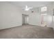 Large bedroom featuring neutral carpet and offering access to an ensuite bathroom at 2329 Sunrise Meadows Dr, Las Vegas, NV 89134