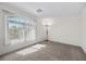 Bedroom features carpet and a large window with window blinds at 2329 Sunrise Meadows Dr, Las Vegas, NV 89134