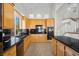 Eat-in kitchen boasts granite countertops, stainless steel appliances, and seamless access to the adjacent living area at 2329 Sunrise Meadows Dr, Las Vegas, NV 89134