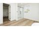 A well-appointed bathroom with a glass-enclosed shower, closet, and light wood-look flooring for a clean aesthetic at 25 Blue Valley Dr, Henderson, NV 89002