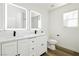 Bathroom featuring a double sink vanity, and sleek black fixtures, exuding modern elegance and convenience at 25 Blue Valley Dr, Henderson, NV 89002