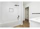Modern bathroom featuring a tiled shower over tub, sleek fixtures, and a bright, clean design at 25 Blue Valley Dr, Henderson, NV 89002