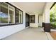 Welcoming front porch area featuring stylish windows and black trim, creating an inviting entrance at 25 Blue Valley Dr, Henderson, NV 89002