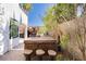 Outdoor kitchen featuring a built-in grill and bar seating, ideal for entertaining guests at 25 Blue Valley Dr, Henderson, NV 89002