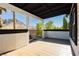 An outdoor living space featuring views of the surrounding landscape and a tiled floor for easy maintenance at 25 Blue Valley Dr, Henderson, NV 89002
