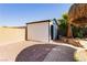 Backyard features a storage shed with plenty of extra room to relax in the pool at 25 Blue Valley Dr, Henderson, NV 89002