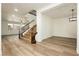 Bright entry view of a staircase with an adjacent dining area at 25 Blue Valley Dr, Henderson, NV 89002