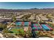 An aerial view shows the community's tennis and bocce ball courts in a neighborhood setting at 2550 Evening Twilight Ave, Henderson, NV 89044