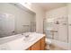 Bathroom featuring a single sink vanity, toilet and shower/tub combination at 2550 Evening Twilight Ave, Henderson, NV 89044