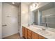 Bathroom with double sinks, and a separate glass enclosed shower at 2550 Evening Twilight Ave, Henderson, NV 89044