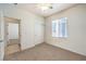 Bedroom with neutral walls, carpet, a window and closet at 2550 Evening Twilight Ave, Henderson, NV 89044