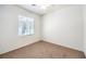 Bedroom featuring neutral walls, carpet and a window at 2550 Evening Twilight Ave, Henderson, NV 89044
