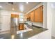 Well-equipped kitchen boasting stainless steel appliances, counter space, and modern fixtures for cooking at 2550 Evening Twilight Ave, Henderson, NV 89044