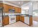 Efficient kitchen equipped with modern appliances, ample cabinetry, and a functional layout at 2550 Evening Twilight Ave, Henderson, NV 89044