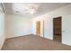 Spacious main bedroom features a ceiling fan with access to a walk-in closet and bathroom at 2550 Evening Twilight Ave, Henderson, NV 89044