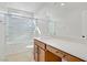 Bathroom with a bath tub, shower combo and ample counter space at 2628 Ferrara St, Henderson, NV 89044