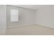 Well lit bedroom featuring plush carpet and neutral walls with natural light at 2628 Ferrara St, Henderson, NV 89044