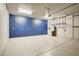 Spacious garage featuring ample lighting and lots of room for vehicles at 2628 Ferrara St, Henderson, NV 89044