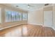 Bedroom with light-colored walls, a ceiling fan, and plenty of natural light at 2668 Ivoryhill St, Las Vegas, NV 89135