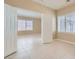 Open bonus room area featuring tile floors and natural light at 2668 Ivoryhill St, Las Vegas, NV 89135